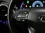 Hyundai Kona Fashion 64kWh 201PK | 1ste eigenaar | ACCU 94% | AppleCarplay/AndroidAuto | Adaptief Cruise Control | Trekhaak | Dodehoekdetectie | Camera | Keyless | AUTOMAAT | Isofix | Privacy Glass | Warmtepomp |