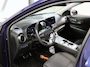 Hyundai Kona Fashion 64kWh 201PK | 1ste eigenaar | ACCU 94% | AppleCarplay/AndroidAuto | Adaptief Cruise Control | Trekhaak | Dodehoekdetectie | Camera | Keyless | AUTOMAAT | Isofix | Privacy Glass | Warmtepomp |