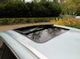Skoda Enyaq IV 80 First Edition 77kWh SOH 91,1%/Trekhaak/Warmtepomp/Panoramadak/Leer/360Camera/Fabrieksgarantie