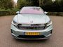Skoda Enyaq IV 80 First Edition 77kWh SOH 91,1%/Trekhaak/Warmtepomp/Panoramadak/Leer/360Camera/Fabrieksgarantie