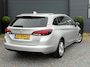 Opel Astra Sports Tourer 1.4 Online Edition ✓2e Eigenaar✓Trekhaak✓Carplay✓Navi✓Recent beurt gehad✓150pk✓Dealer Onderhouden✓6 Bak✓Pdc V+A✓Lm velgen✓Clima✓Cruise✓N.A.P✓Apk tot 06-2027