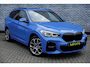 BMW X1 sDrive18i Business Edition | M-Sport | Trekhaak | Panoramadak | Head-up Display | HiFi Audio | Sportstoelen | Lichtmetalen Velgen 19 inch | Achteruitrijcamera | Keyless Entry | Elektrische Achterklep | Privacy Glas | Navigatie