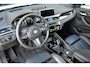 BMW X1 sDrive20i Orange Edition II * Head-up * Panoramadak * Stoelmemory * Camera * Trekhaak *