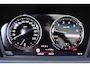 BMW X1 sDrive20i Orange Edition II * Head-up * Panoramadak * Stoelmemory * Camera * Trekhaak *