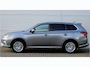 Mitsubishi Outlander PHEV 2.4 INSTYLE 4WD | PLUG IN HYBRID | SoH 75% | V2H | FULL OPTIONS | SCHUIFDAK | ADAPTIEF CRUISE | TREKHAAK 1500KG | FABRIEKSGARANTIE TOT 12-12-2027* | ALL IN RIJKLAARPRIJS