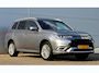 Mitsubishi Outlander PHEV 2.4 INSTYLE 4WD | PLUG IN HYBRID | SoH 75% | V2H | FULL OPTIONS | SCHUIFDAK | ADAPTIEF CRUISE | TREKHAAK 1500KG | FABRIEKSGARANTIE TOT 12-12-2027* | ALL IN RIJKLAARPRIJS