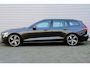Volvo V60 2.0 T4 R-Design | Trekhaak | 19-Inch Lichtmetalen Velgen | Sportchassis | Elektrisch Verstelbare Bestuurdersstoel Met Geheugen | Cruise Control | Elektrische Achterklep | Verwarmbare Voorstoelen | Adaptieve LED Koplampen met Bochtverlichting | Getint Glas Achter | Nappa Leder/Open Grid Textiel | Apple Carplay/Android Auto | Achteruitrijcamera | Parkeersensoren Voor & Achter |
