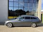 Mercedes-Benz E-klasse Estate 200 Premium, Luchtvering, Trekhaak, 4 seizoenen banden, Elektrische stoelen & sfeerverlichting