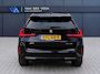 BMW X1 sDrive18i M-Sport | Panorama dak | Elektrisch wegklapbare trekhaak | Stoelverwarming | Achteruitrijcamera | Elektrische kofferbakklep | Keyless entry/start | Half leder/alcantara | Draadloze telefoonlader | Apple CarPlay/Android Auto | Navigatie | Climate controle | Parkeersensoren V+A |