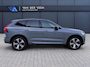 Volvo XC60 2.0 T6 Plug-in hybrid AWD Plus Dark | Incl. 12 maanden Garantie | SoH 96% | Panorama dak | Keyless entry/start | Achteruitrijcamera | Elektrische kofferbakklep | Memory stand stoelen | Adaptive cruise | Apple CarPlay/Android Auto | Climate controle | Draadloze telefoonlader | Lederen bekleding |
