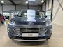 Ford Kuga 2.5 PHEV 225 pk Titanium | Trekhaak | Winter Pack | 100% dealer onderh. | SOH 87,1% | Camera | Cruise | 4 seiz. banden |