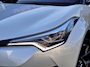 Toyota C-HR / C-HR+ 1.8 Hybrid Bi-Tone Plus | JBL, Dodehoekherkenning, Parkeersensoren, Stoel + Stuurverwarming, LED Pakket