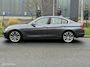 BMW 3-Serie 320i High Executive Cremeleer Navi Pdc Headup