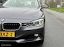 BMW 3-Serie 320i High Executive Cremeleer Navi Pdc Headup
