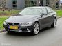 BMW 3-Serie 320i High Executive Cremeleer Navi Pdc Headup