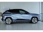 Hyundai Kona Electric Premium 65.4 kWh | Achterspoiler | Achterstoelen verwarmd | Achteruitrijcamera