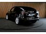 Tesla Model Y Long Range Dual - Motor AWD 75 kWh Navi Camera Leer Warmtepomp ACC Autopilot PDC Elektr. achterklep Stoelverwarmimg voor en achter Stuurverwarming BTW auto