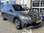 Volkswagen Tiguan 1.4 TSI eHybrid 2X R-Line / 245 PK/ AUTOMAAT/ TREKHAAK/ PANO/ KEYLESS/ DIGITAL DASH/ HEAD-UP DISPLAY/ NAVI/ APP-CONNECT/ PARK. SENSOREN/ CLIMA/ STOELVERWARMING/ 20" LMV