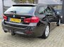 BMW 3-Serie Touring 320i Luxury + PANO DAK + LED + HALF LEER