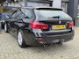 BMW 3-Serie Touring 320i Luxury + PANO DAK + LED + HALF LEER