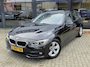 BMW 3-Serie Touring 320i Luxury + PANO DAK + LED + HALF LEER