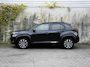 Toyota Yaris Cross First Edition 1.5 Hybrid 115pk Automaat DODE HOEK | DAB | STOELVERWARMING | ADAP. CRUISE