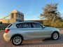 BMW 1-Serie 114i Upgrade Edition_AIRCO_LEER_NETTE AUTO