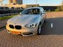 BMW 1-Serie 114i Upgrade Edition_AIRCO_LEER_NETTE AUTO