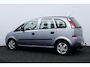 Opel Meriva 1.6-16V Maxx Cool/ Trekhaak/ 15'' LMV/ Clima/ Cruise/ Elek. pakket/ Armsteun/ LEDER. Stuur/ 15'' LMV/ Getint glas/ Metallic lak.