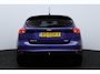 Ford Focus 1.0 Titanium/ Trekhaak/ 16'' LMV/ Android-Auto/ Navi/ Clima/ Cruise/ Elek. pakket/ Isofix/ Bluetooth/ 6-Bak/ Armsteun/ Multi. LEDER. Stuur/ Mistl./ PDC V+A/ Extra getint glas.