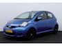 Toyota Aygo 1.0-12V Comfort Navigator/ 5-Drs/ Airco/ C.V. Afstand/ Elek. Ramen/ Isofix/ Deelbare achterbank/ Getint glas/ Metallic lak.