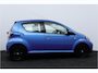Toyota Aygo 1.0-12V Comfort Navigator/ 5-Drs/ Airco/ C.V. Afstand/ Elek. Ramen/ Isofix/ Deelbare achterbank/ Getint glas/ Metallic lak.